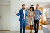 a man and a woman standing in a room